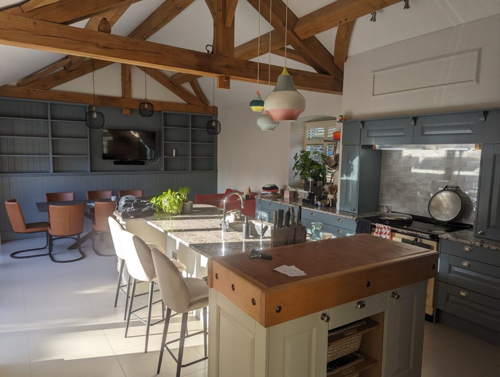 Hand painted kitchen in Hampshire doors and units, island painted in a different colour